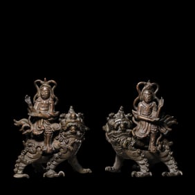 A pair of seated Buddha statues from the Yuan Dynasty
