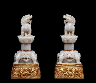A pair, china Liao Dynasty lion jade weights