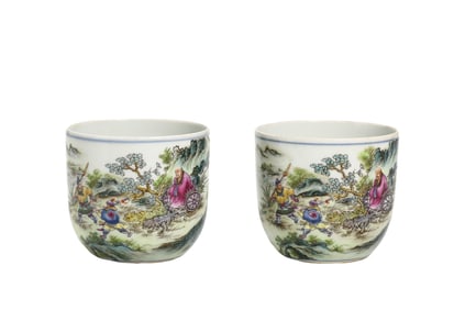 A pair of Chinese Qing Dynasty Qianlong period Guiguzi descending mountain pattern cups