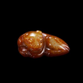 White jade red stained crouching beast from Han Dynasty of China