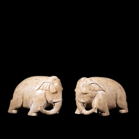 A pair of Chinese Han Dynasty jade elephants