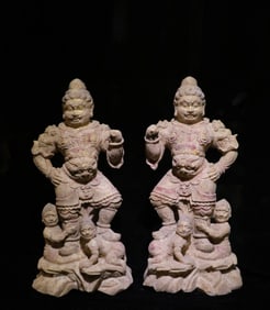 A pair of Chinese Tang Dynasty white marble painted statues of standing kings