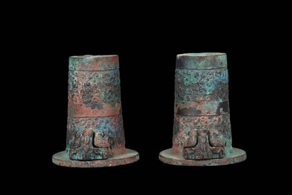 A pair of Chinese Spring and Autumn period bronze chariot and horse parts