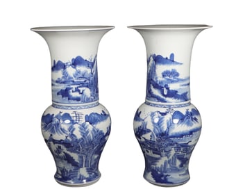 A pair of China Qing Dynasty blue and white landscape appreciation bottles