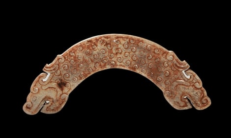 Double dragon jade pendant from the Spring and Autumn Period, China