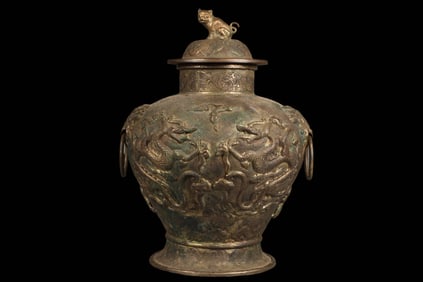 Silver dragon-patterned double-ring lidded jar from the Tang Dynasty, China