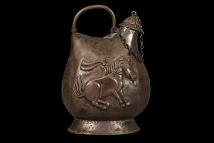 Silver gilt dancing horse with ring-shaped pattern silver pot from the Tang Dynasty, China