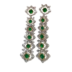 Emerald earrings set in 18-karat gold diamonds