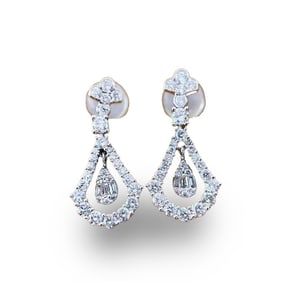 18-karat gold earrings set with diamonds