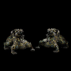 A PAIR OF BRONZE AND SILVER BEASTS FROM WARE WARRING STATES PERIOD