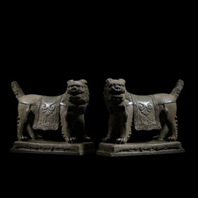 A PAIR OF CHINESE QING DYNASTY BLUESTONE LIONS STANDING STATUES