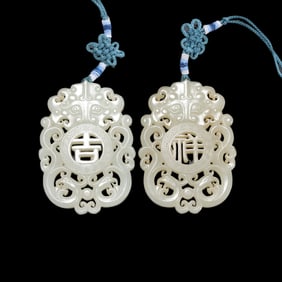 A PAIR OF CHINESE QING DYNASTY HOTAN WHITE JADE AUSPICIOUS PLATE