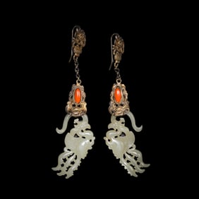 A PAIR OF LIAO HETIAN JADE DOUBLE PHOENIX EARRINGS