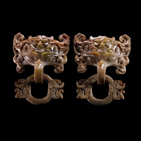A PAIR OF CHINESE JADE SHOP HEADS, HAN DYNASTY