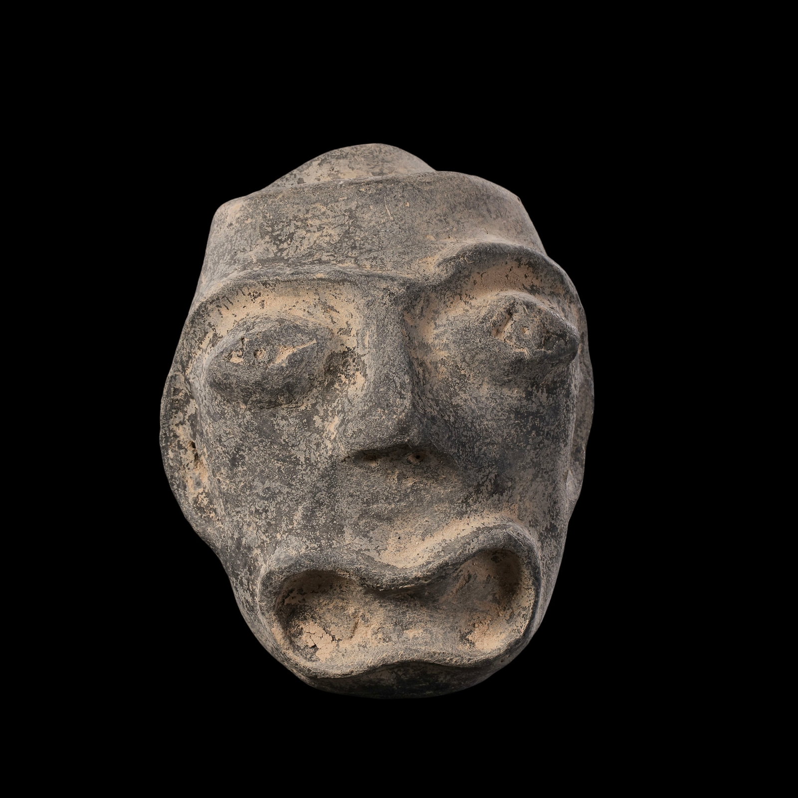 Hongshan culture pottery head of the Hongshan period in China: L. 12 cm. W. 11 cm.
