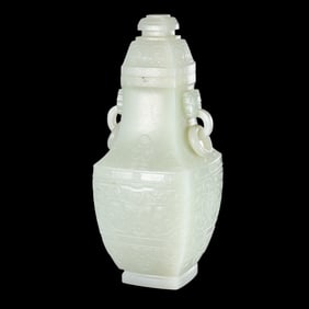 Chinese Qing Dynasty Hetian white jade animal face pattern double ring ear cover bottle