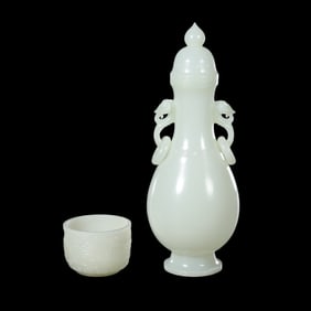 A set of Chinese Qing Dynasty Hetian jade covered vases and dragon-patterned cups