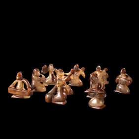 A group of red agate music figurines from the Warring States Period of China