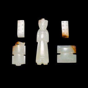 A set of five white jade talismans from the Han Dynasty in China