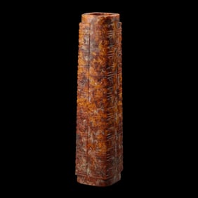 Chinese Neolithic jade cong with animal faces