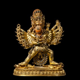 A Chinese Qing Dynasty Gilt Bronze and Gem-Inlaid Standing Buddha