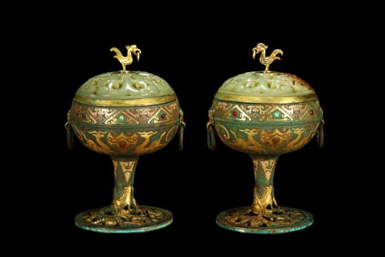 A pair of gold, silver and jade inlaid censers from the Warring States Period of China