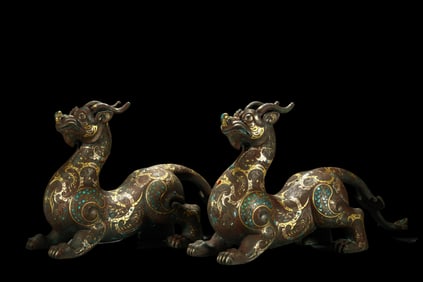 A pair of gold and silver auspicious beasts from the Warring States Period of China