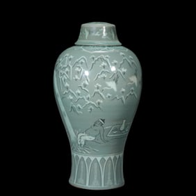 Korean celadon vase with black and white inlaid figures and stories
