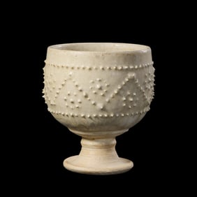 Chinese Sui Dynasty Xiangzhou Kiln Celadon Stem Cup with Drum-nail Pattern