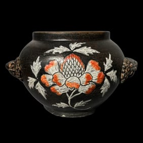 Korean black-glazed jar with animal ears and lotus pattern