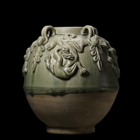 Chinese Sui Dynasty Xiangzhou kiln celadon four-handled jar with plastic