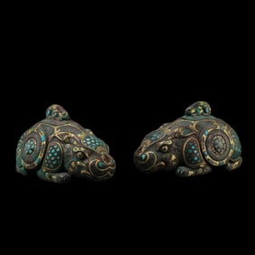 A pair of gold and silver auspicious beasts from the Warring States Period of China