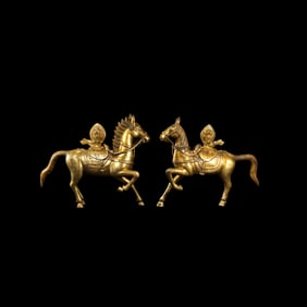 A pair of Chinese Qing Dynasty gilt-bronze Buddhist horses