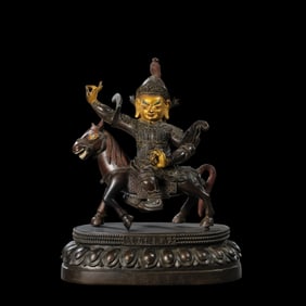 A partially gilded bronze six-stage Buddha statue from the Qianlong period of the Qing Dynasty,