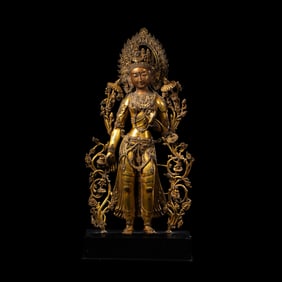 A Chinese Ming Dynasty gilt bronze standing Buddha statue