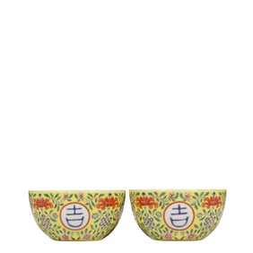 A pair of Chinese Qianlong-period famille rose floral cups