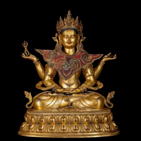 A Chinese gilt bronze statue of a seated Buddha from the Qianlong period of the Qing Dynasty