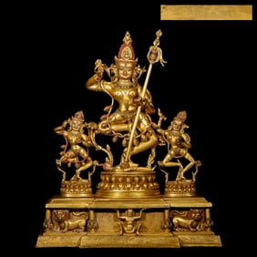 A Chinese Qing Dynasty gilt bronze standing Buddha statue