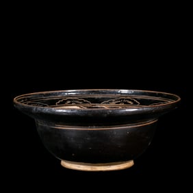 Black-glazed bowl with carved floral pattern from the Cizhou kiln, Northern Song Dynasty, China