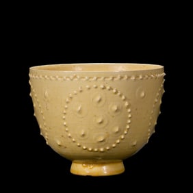 Chinese Sui Dynasty yellow glaze drum nail pattern cup