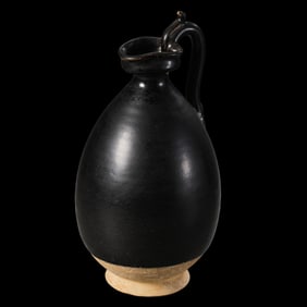 Chinese Tang Dynasty Gongxian kiln black glaze dragon handle pot