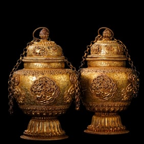 A pair of Chinese Qing Dynasty gilt bronze incense burner jars with lids