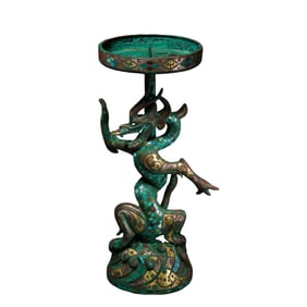 Gold and silver inlaid dragon-shaped candlestick from the Warring States period of China