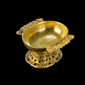 A pure gold double-eared stemmed cup from the Tang Dynasty in China