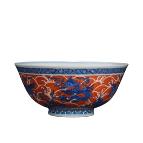 Blue and white porcelain bowl with iron-red dragon design from the Qianlong period of the Qing