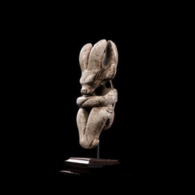 Chicken-bone white jade sun god statue from the Hongshan Culture of the Neolithic period in China