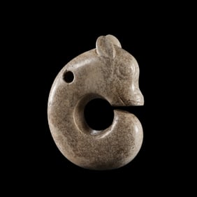 Chicken-bone white jade pig dragon from the Hongshan Culture of the Neolithic period in China