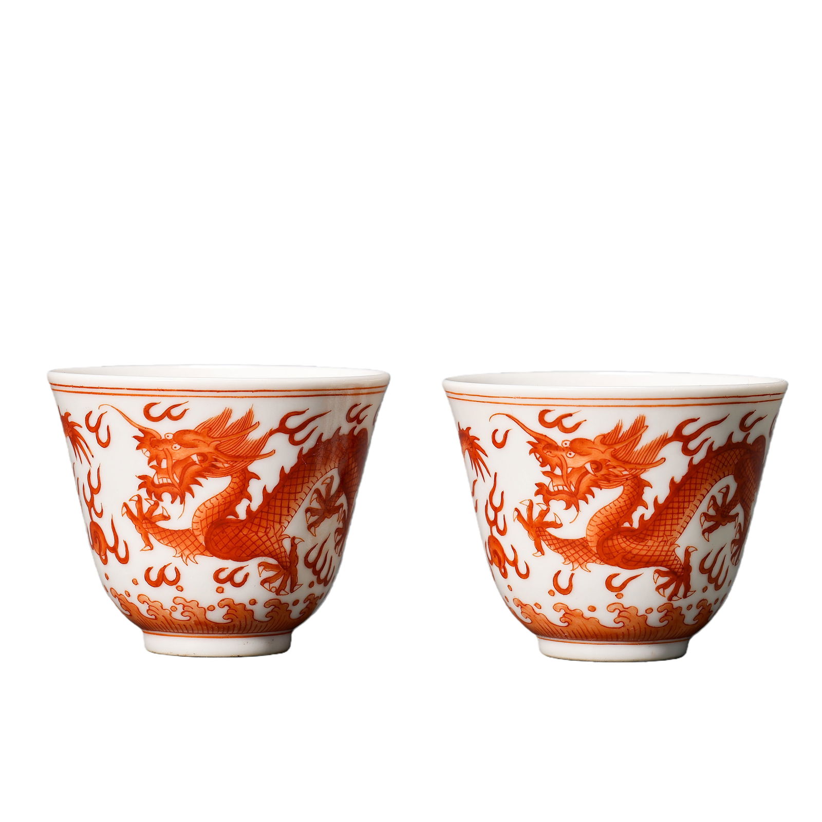A pair of Chinese Qing Dynasty Guangxu period iron-red dragon pattern cups (1 of 8)