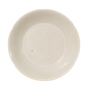 white porcelain dish with lotus flower design from the Ding kiln of the Northern Song Dynasty,