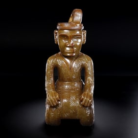 Jade kneeling figure from the Western Zhou Dynasty in China